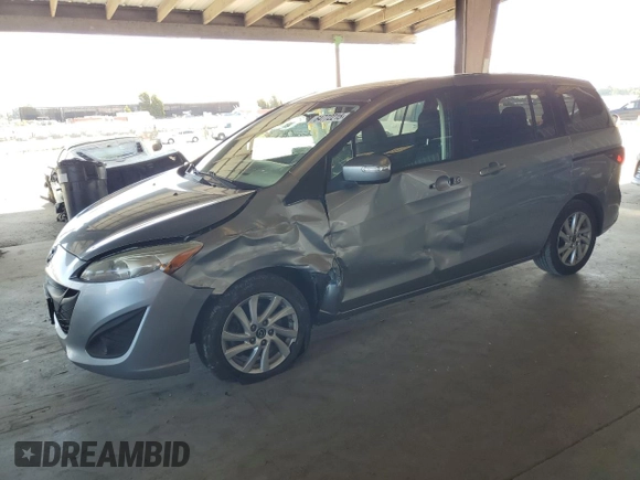 2014 Mazda 5 Sport with VIN JM1CW2BL9E0163445, listed as a Copart auction lot 64772215 with 86,020 mi miles and Salvage title. Bid and sale history available at DreamBid. Image 1.