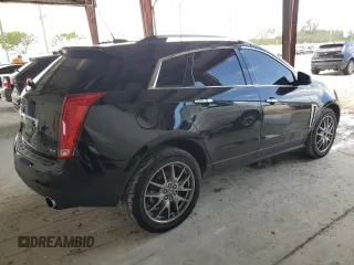 2015 Cadillac SRX Premium Collection z VIN 3GYFNDE38FS596718, wystawiony jako Copart lot #56674245 z przebiegiem 106 379 mil mil oraz Szkody całkowita. Historia ofert i sprzedaży dostępna na DreamBid. Obrazek 3.