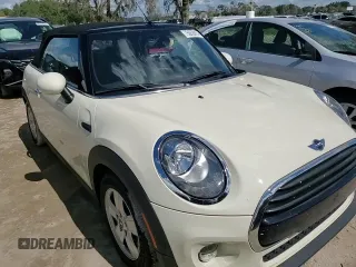 2017 MINI Convertible Cooper z VIN WMWWG5C38H3C99627, wystawiony jako Copart lot #75053914 z przebiegiem 42 087 mil mil oraz Nie do naprawy • Non repairable. Historia ofert i sprzedaży dostępna na DreamBid. Obrazek 14.