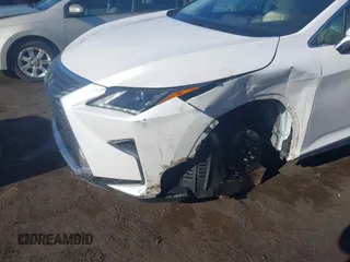 2018 Lexus RX 350 z VIN 2T2BZMCAXJC161520, wystawiony jako IAAI lot #41357954 z przebiegiem 105 427 mil mil oraz . Historia ofert i sprzedaży dostępna na DreamBid. Obrazek 6.