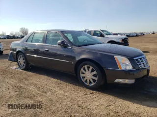 2008 Cadillac DTS 1SC z VIN 1G6KD57Y68U111388, wystawiony jako Copart lot #54204465 z przebiegiem 122 077 mil mil oraz Szkoda całkowita • Salvage title. Historia ofert i sprzedaży dostępna na DreamBid. Obrazek 4.