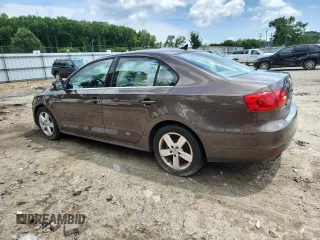 2014 Volkswagen Jetta TDI w/Premium with VIN 3VW3L7AJ9EM303218, listed as a Copart auction lot 64261985 with 187,371 mi miles and Clean title. Bid and sale history available at DreamBid. Image 2.