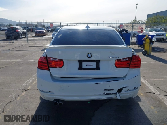 2015 BMW 3 Series 328i with VIN WBA3C1C52FK119339, listed as a IAAI auction lot 41549876 with 148,347 mi miles and . Bid and sale history available at carsss.com. Image 16.