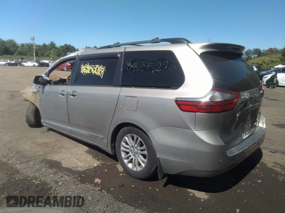 2015 Toyota Sienna XLE with VIN 5TDYK3DC1FS657933, listed as a IAAI auction lot 34212306 with 107,281 mi miles and . Bid and sale history available at DreamBid. Image 3.
