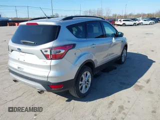 2017 Ford Escape SE with VIN 1FMCU0GDXHUB27848, listed as a IAAI auction lot 42047589 with 128,823 mi miles. Bid and sale history available at carsss.com. Image 4.