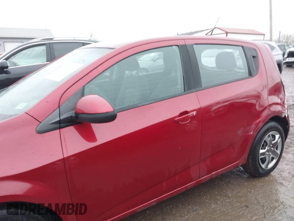 2013 Chevrolet Sonic LS z VIN 1G1JA6SH4D4244183, wystawiony jako IAAI lot #41467466 z przebiegiem 75 315 mil mil oraz . Historia ofert i sprzedaży dostępna na DreamBid. Obrazek 14.