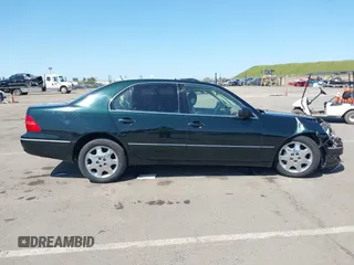 2001 Lexus LS 430 z VIN JTHBN30F810045610, wystawiony jako IAAI lot #42004279 z przebiegiem 143 497 mil mil oraz . Historia ofert i sprzedaży dostępna na DreamBid. Obrazek 12.