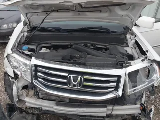 2012 Honda Pilot Touring z VIN 5FNYF4H93CB030515, wystawiony jako IAAI lot #41936563 z przebiegiem Nie podano mil oraz . Historia ofert i sprzedaży dostępna na DreamBid. Obrazek 10.