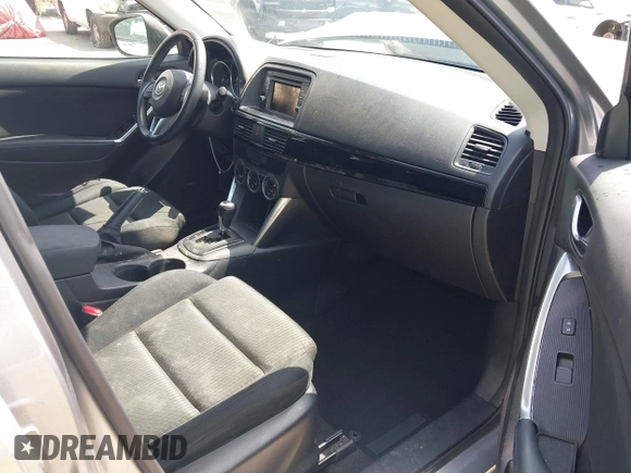 2014 Mazda CX-5 Touring z VIN JM3KE2CYXE0322943, wystawiony jako IAAI lot #41934670 z przebiegiem 110 690 mil mil oraz . Historia ofert i sprzedaży dostępna na DreamBid. Obrazek 5.