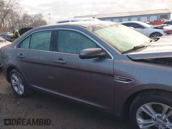 2013 Ford Taurus SEL z VIN 1FAHP2E84DG193376, wystawiony jako IAAI lot #41661721 z przebiegiem 136 341 mil mil oraz . Historia ofert i sprzedaży dostępna na DreamBid. Obrazek 13.