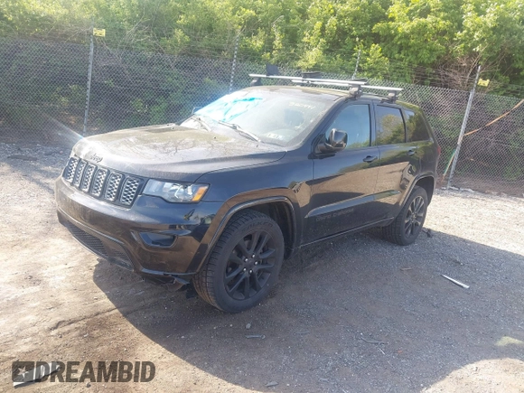 2018 Jeep Grand Cherokee Laredo E with VIN 1C4RJFAG2JC320441, listed as a IAAI auction lot 42095419 with 136,962 mi miles. Bid and sale history available at carsss.com. Image 17.