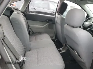 2005 Ford Focus S with VIN 3FAFP37N75R120187, listed as a Copart auction lot 57390605 with 163,547 mi miles and Salvage title. Bid and sale history available at DreamBid. Image 10.