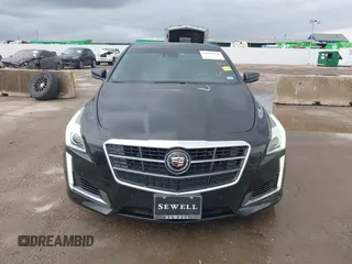 2014 Cadillac CTS Vsport Premium RWD z VIN 1G6AV5S89E0148907, wystawiony jako IAAI lot #41880678 z przebiegiem 148 052 mil mil oraz . Historia ofert i sprzedaży dostępna na DreamBid. Obrazek 12.