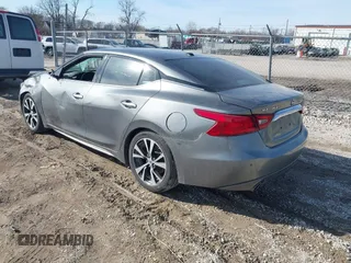2018 Nissan Maxima SL z VIN 1N4AA6AP2JC378066, wystawiony jako IAAI lot #41764723 z przebiegiem 101 620 mil mil oraz . Historia ofert i sprzedaży dostępna na DreamBid. Obrazek 3.