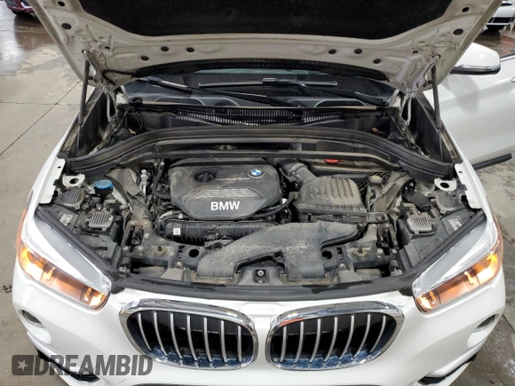 2017 BMW X1 xDrive28i with VIN WBXHT3Z38H4A53824, listed as a Copart auction lot 52500215 with 106,782 mi miles and Salvage title. Bid and sale history available at DreamBid. Image 13.