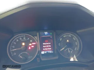 2020 Toyota Tacoma 4WD SR5 with VIN 5TFCZ5AN6LX235847, listed as a IAAI auction lot 41676928 with 77,384 mi miles. Bid and sale history available at carsss.com. Image 7.