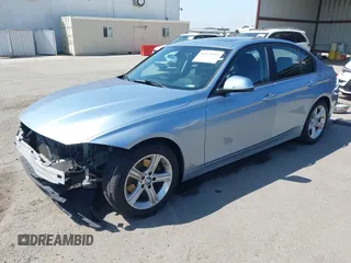 2014 BMW 3 Series 328i with VIN WBA3C1C51EK115278, listed as a IAAI auction lot 41979591 with 129,112 mi miles. Bid and sale history available at carsss.com. Image 2.