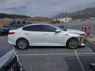 2017 Kia Optima EX with VIN 5XXGU4L38HG134961, listed as a IAAI auction lot 41976191 with 91,874 mi miles. Bid and sale history available at carsss.com. Image 13.