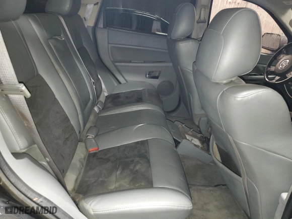 2007 Jeep Grand Cherokee SRT-8 with VIN 1J8HR78377C512937, listed as a Copart auction lot 83219784 with 158,485 mi miles and Salvage Title. Bid and sale history available at carsss.com. Image 10.