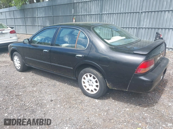 1998 Nissan Maxima GXE with VIN JN1CA21D2WM923835, listed as a IAAI auction lot 42221419 with 256,441 mi miles and . Bid and sale history available at DreamBid. Image 3.