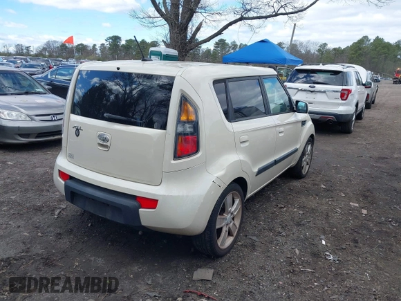 2010 Kia Soul + with VIN KNDJT2A2XA7034348, listed as a IAAI auction lot 42059954 with 252,878 mi miles. Bid and sale history available at carsss.com. Image 4.