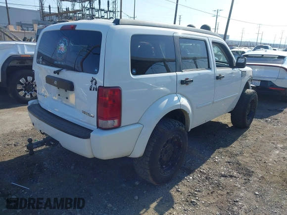 2011 Dodge Nitro Heat with VIN 1D4PT4GK9BW596989, listed as a IAAI auction lot 42397427 with 158,609 mi miles and . Bid and sale history available at DreamBid. Image 4.
