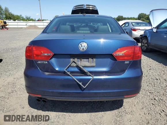 2014 Volkswagen Jetta SE with VIN 3VWD17AJ9EM323625, listed as a Copart auction lot 58211655 with 108,099 mi miles and Salvage title. Bid and sale history available at DreamBid. Image 6.