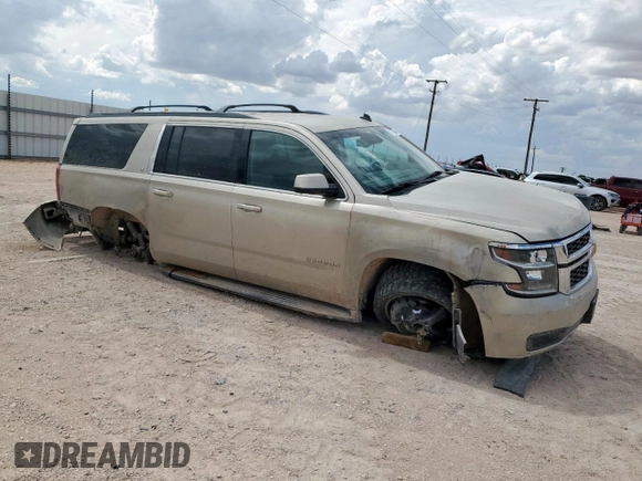 2015 Chevrolet Suburban LT with VIN 1GNSCJKC0FR153454, listed as a Copart auction lot 62672615 with 184,498 mi miles and Salvage title. Bid and sale history available at DreamBid. Image 4.