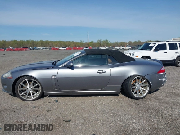 2007 Jaguar XK with VIN SAJWA44B075B11143, listed as a IAAI auction lot 42044257 with 122,842 mi miles. Bid and sale history available at carsss.com. Image 14.
