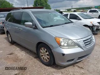 2010 Honda Odyssey EX z VIN 5FNRL3H48AB105928, wystawiony jako IAAI lot #42490225 z przebiegiem 119 079 mil mil oraz . Historia ofert i sprzedaży dostępna na DreamBid. Obrazek 1.