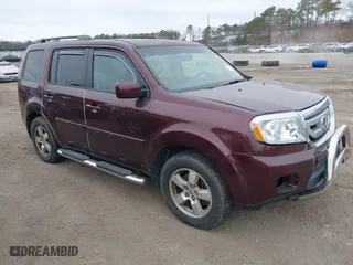 2009 Honda Pilot EX-L with VIN 5FNYF48569B018445, listed as a IAAI auction lot 41808595 with 999,999 mi miles. Bid and sale history available at carsss.com. Image 1.
