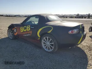 2008 Mazda MX-5 Miata Grand Touring z VIN JM1NC26F780144189, wystawiony jako Copart lot #52204015 z przebiegiem 71 339 mil mil oraz Szkoda całkowita • Salvage title. Historia ofert i sprzedaży dostępna na DreamBid. Obrazek 2.