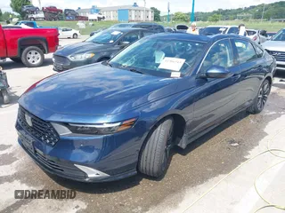 2023 Honda Accord Touring with VIN 1HGCY2F81PA048434, listed as a IAAI auction lot 42306343 with 14,878 mi miles and . Bid and sale history available at DreamBid. Image 2.