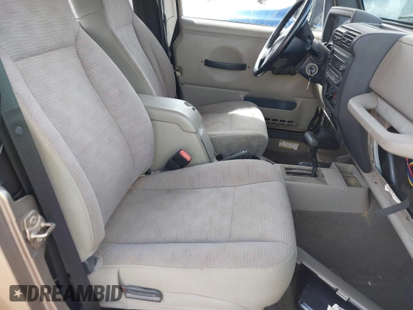 2005 Jeep Wrangler Sport with VIN 1J4FA49SX5P317120, listed as a IAAI auction lot 42677397 with 71,403 mi miles and . Bid and sale history available at DreamBid. Image 5.