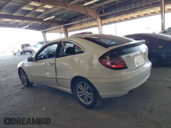 2003 Mercedes-Benz C 230 Kompressor with VIN WDBRN40J83A432695, listed as a Copart auction lot 84214584 with 131,550 mi miles and Salvage title. Bid and sale history available at DreamBid. Image 2.