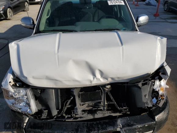 2011 Chevrolet Silverado 1500 Work Truck with VIN 1GCRKPE39BZ128975, listed as a Copart auction lot 76124704 with 180,814 mi miles and Salvage Title. Bid and sale history available at DreamBid. Image 11.