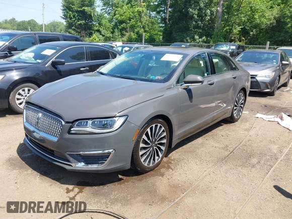 2017 Lincoln MKZ Hybrid Black Label with VIN 3LN6L5NU8HR639681, listed as a IAAI auction lot 42571227 with 123,522 mi miles and . Bid and sale history available at DreamBid. Image 2.