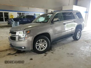 2018 Chevrolet Tahoe LT with VIN 1GNSKBKC1JR368178, listed as a Copart auction lot 60198975 with 127,651 mi miles and Salvage title. Bid and sale history available at DreamBid. Image 1.