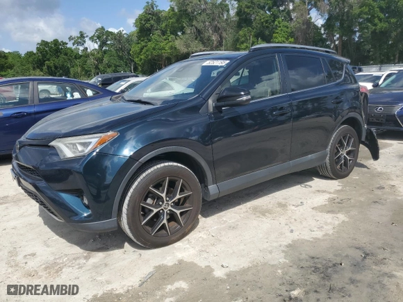 2018 Toyota RAV4 SE with VIN JTMJFREVXJD256779, listed as a Copart auction lot 52521195 with 100,453 mi miles and Salvage Title. Bid and sale history available at carsss.com. Image 1.