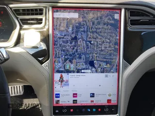 2014 Tesla Model S 60 z VIN 5YJSA1H16EFP28486, wystawiony jako IAAI lot #41887484 z przebiegiem 99 271 mil mil oraz . Historia ofert i sprzedaży dostępna na DreamBid. Obrazek 18.