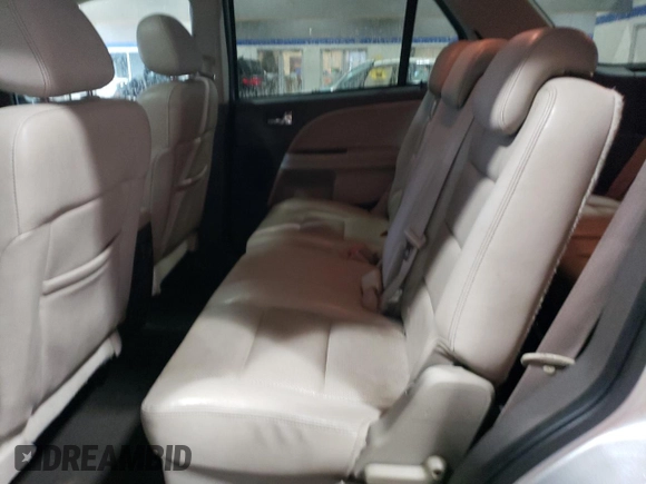 2009 Ford Taurus X Limited with VIN 1FMDK03W59GA01446, listed as a Copart auction lot 80666874 with 135,957 mi miles and Salvage title. Bid and sale history available at DreamBid. Image 11.