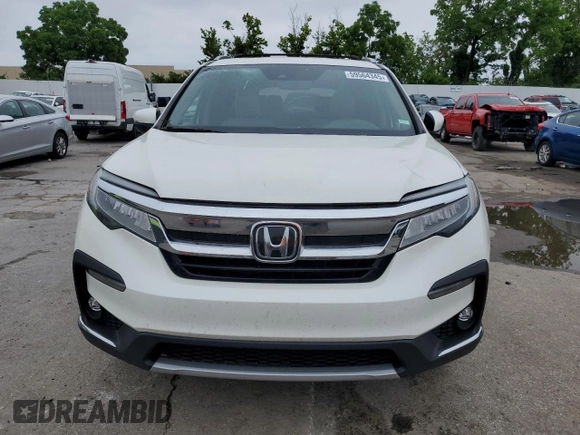 2019 Honda Pilot Touring 7-Passenger with VIN 5FNYF6H6XKB059073, listed as a Copart auction lot 59564345 with 81,599 mi miles and Salvage title. Bid and sale history available at DreamBid. Image 5.