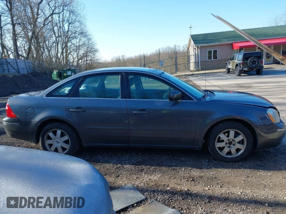2005 Ford Five Hundred SE z VIN 1FAFP231X5G145153, wystawiony jako IAAI lot #42059747 z przebiegiem 59 114 mil mil oraz . Historia ofert i sprzedaży dostępna na DreamBid. Obrazek 13.