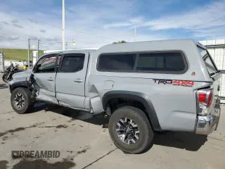 2020 Toyota Tacoma SR5 with VIN 3TMDZ5BN6LM097302, listed as a Copart auction lot 57503895 with 77,212 mi miles and Salvage title. Bid and sale history available at DreamBid. Image 2.