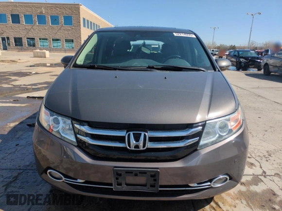 2014 Honda Odyssey Touring with VIN 5FNRL5H95EB052523, listed as a Copart auction lot 52214055 with 131,350 mi miles and Salvage Title. Bid and sale history available at DreamBid. Image 5.