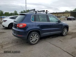 2011 Volkswagen Tiguan SEL z VIN WVGBV7AX2BW534482, wystawiony jako Copart lot #61097265 z przebiegiem 186 282 mil mil oraz Czysty tytuł • Clean title. Historia ofert i sprzedaży dostępna na DreamBid. Obrazek 3.
