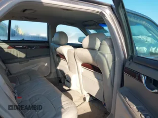 2002 Cadillac DeVille DHS z VIN 1G6KE57Y52U283531, wystawiony jako IAAI lot #41640930 z przebiegiem 94 435 mil mil oraz . Historia ofert i sprzedaży dostępna na DreamBid. Obrazek 8.