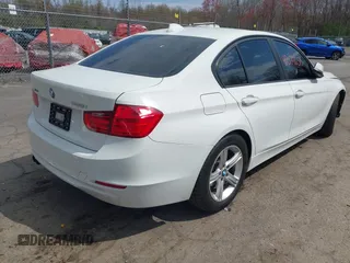 2015 BMW 3 Series 328i xDrive with VIN WBA3B5C51FF960765, listed as a IAAI auction lot 42074658 with 106,598 mi miles and . Bid and sale history available at DreamBid. Image 4.