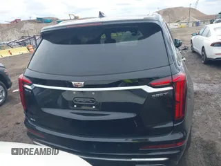 2024 Cadillac XT6 AWD Luxury z VIN 1GYKPBR49RZ723838, wystawiony jako IAAI lot #42346554 z przebiegiem 27 525 mil mil oraz . Historia ofert i sprzedaży dostępna na DreamBid. Obrazek 16.