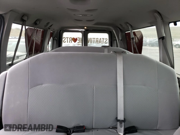 2012 Ford Econoline Passenger XL with VIN 1FBSS3BS4CDB20579, listed as a Copart auction lot 50754515 with 189,191 mi miles and Salvage Title. Bid and sale history available at DreamBid. Image 10.